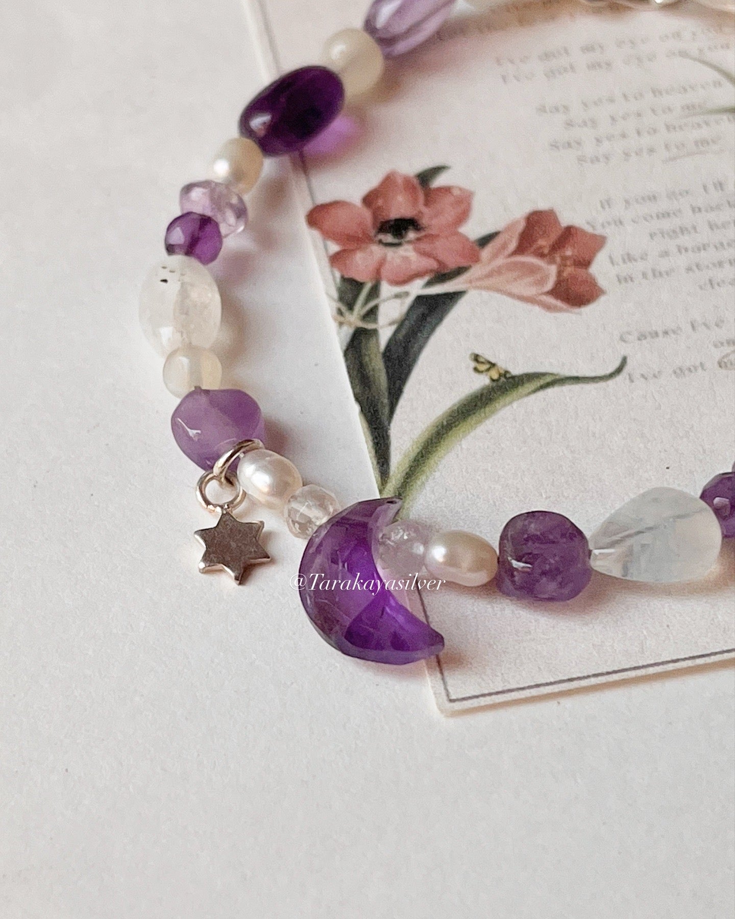 Amethyst moon and star charm bracelet in sterling silver