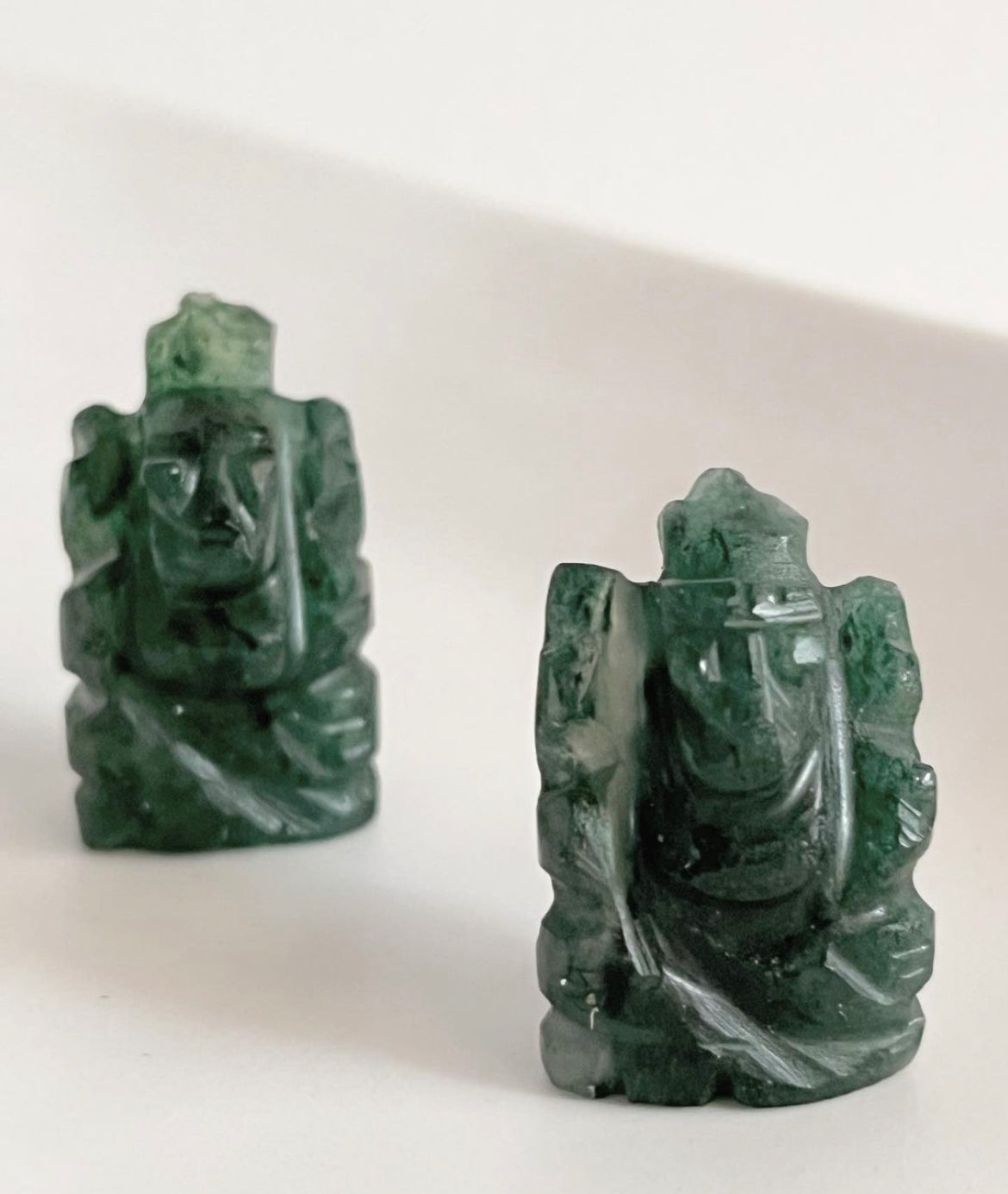 Green jade Ganesh Ji sculpture with intricate hand-carving