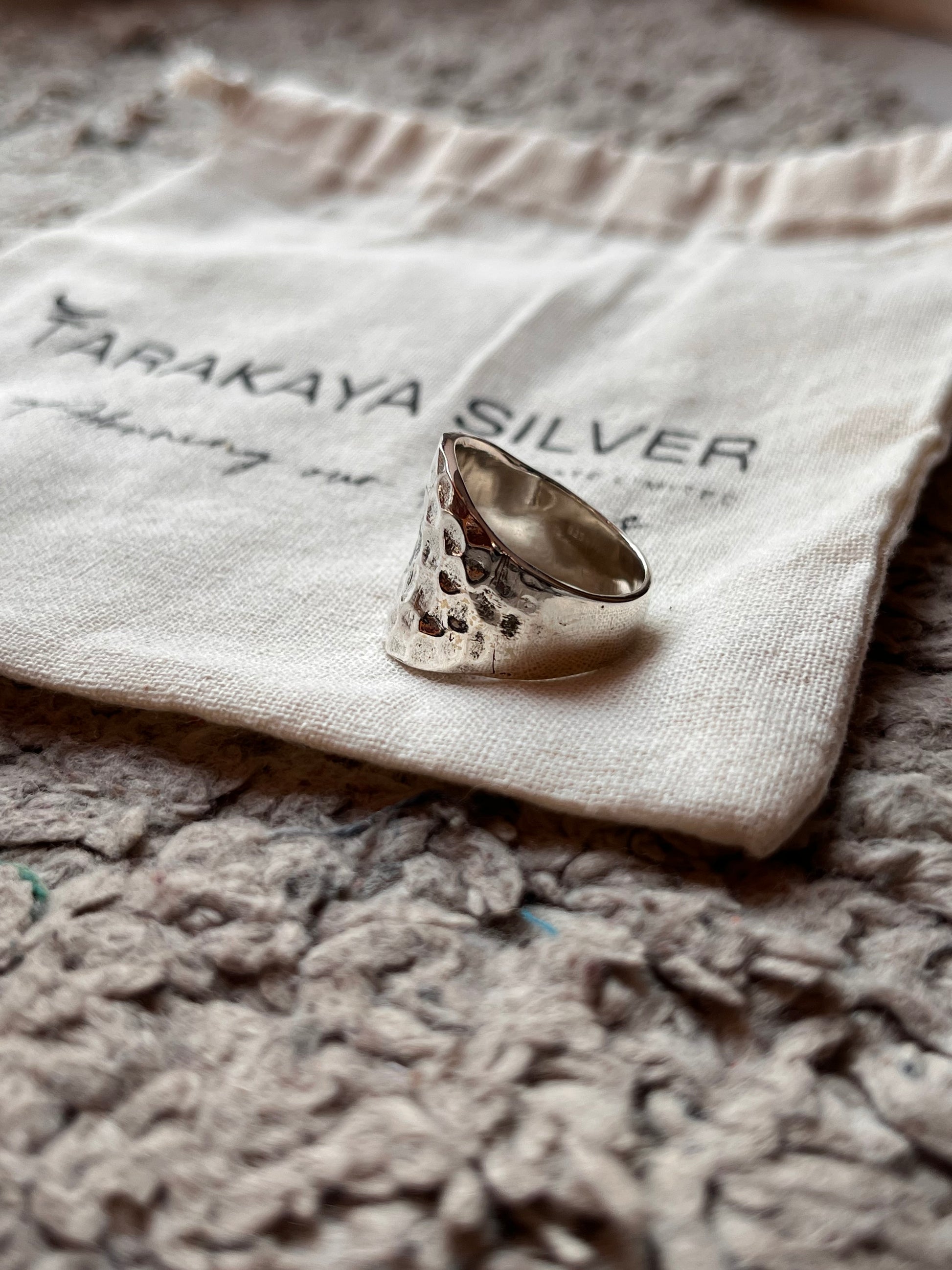 Elegant hammered chunky silver ring design