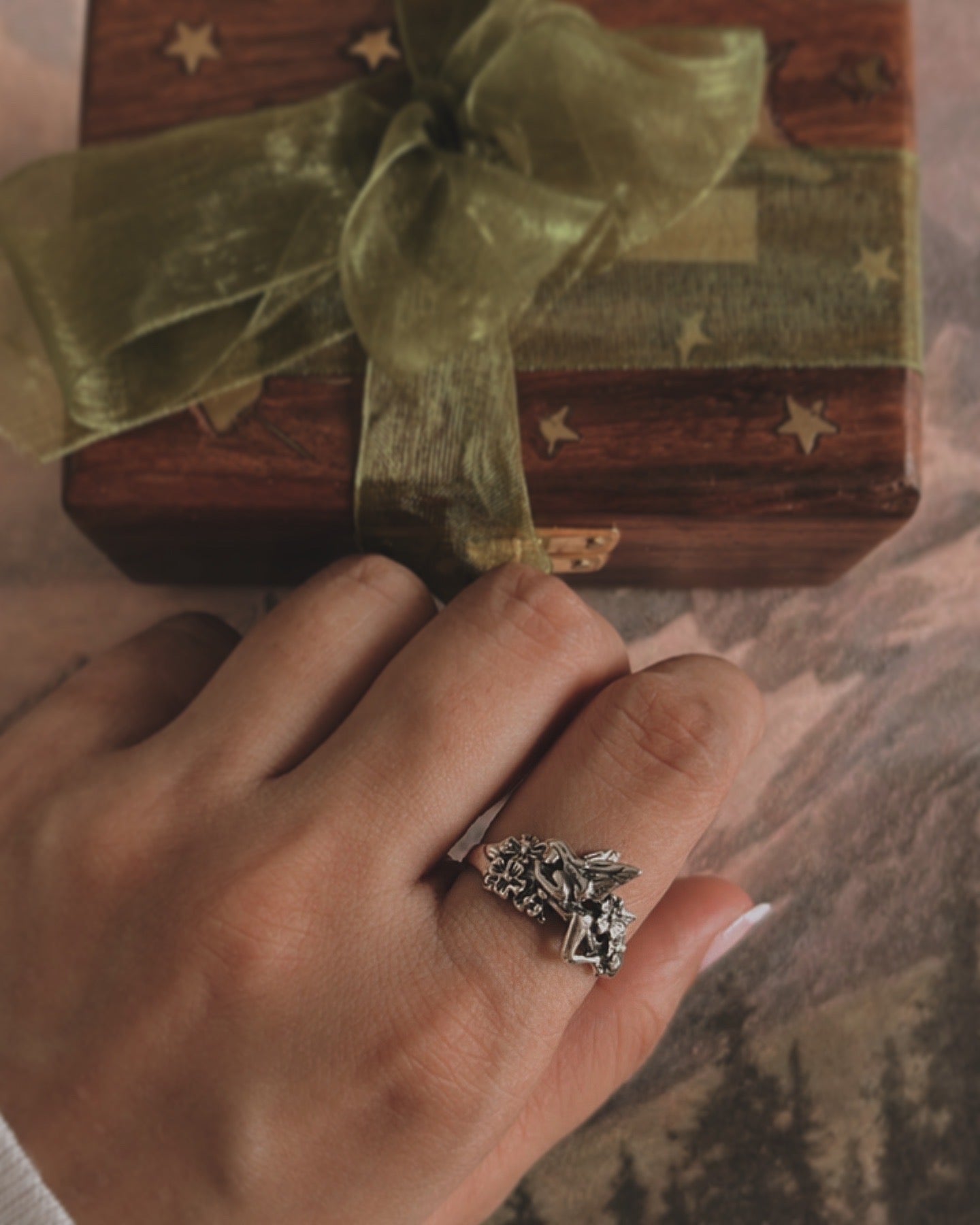 Elegant fairy in the garden silver ring capturing a mystical garden theme