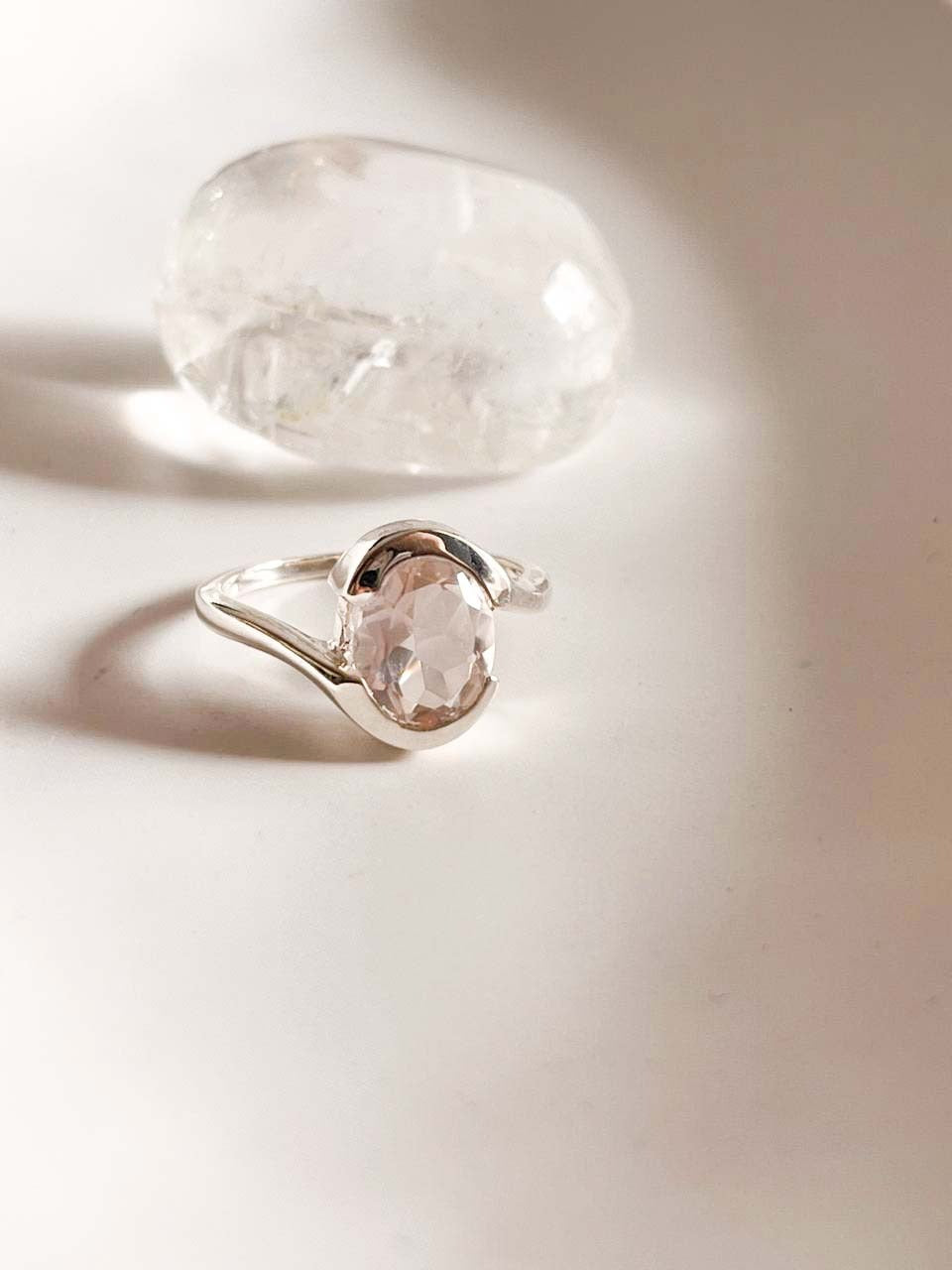 Rose quartz oval cross band silver ring with unique design
