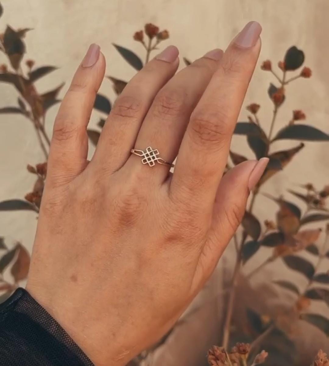 Intricate Karma Celtic Knot Silver Ring Design