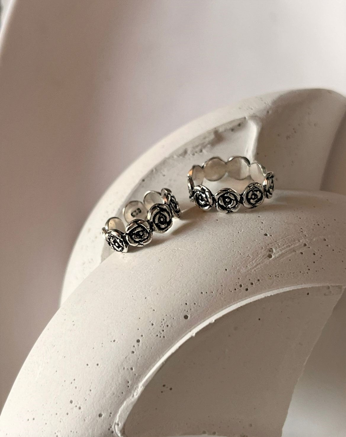 Sterling silver toe ring featuring a roses band motif