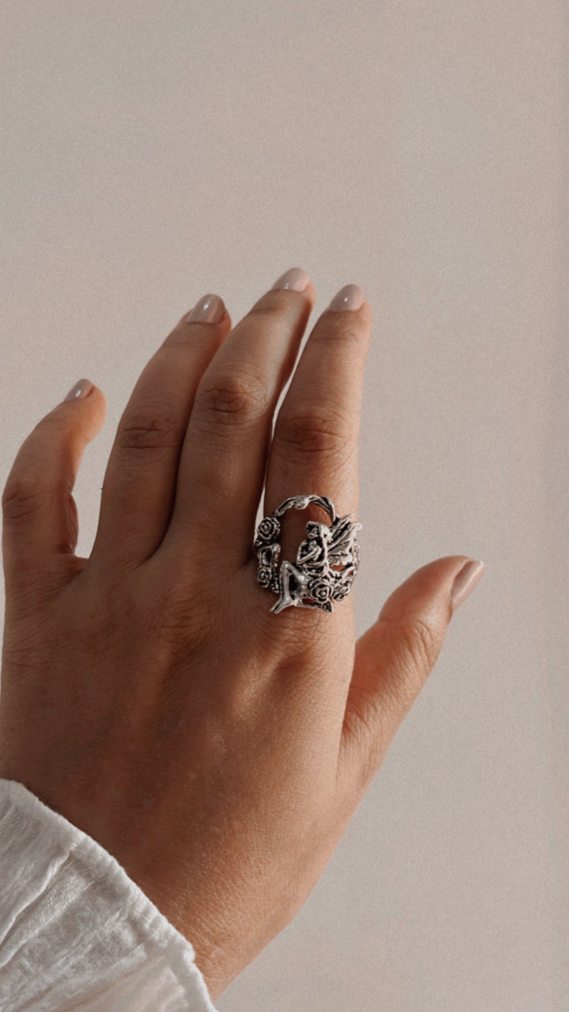 Handcrafted fairy in forest silver ring with enchanting, nature-driven design