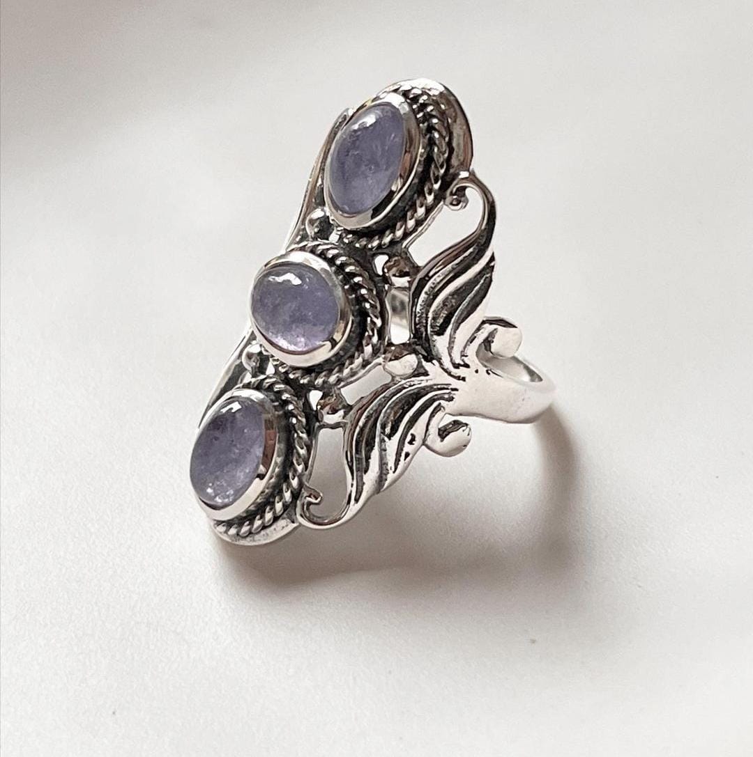 Elegant tanzanite 3 stone silver statement ring