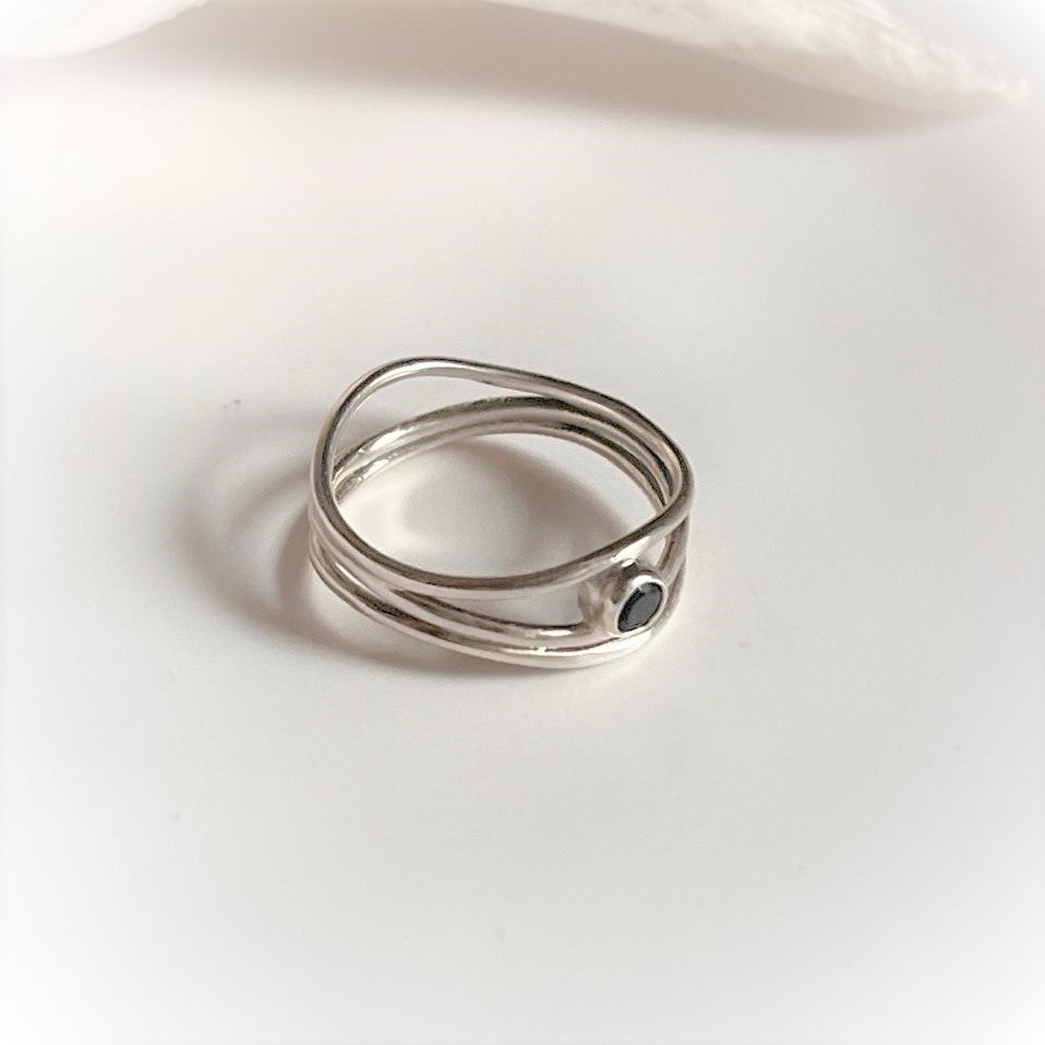 Sleek Wire Wrapped Silver Ring Featuring Black Onyx