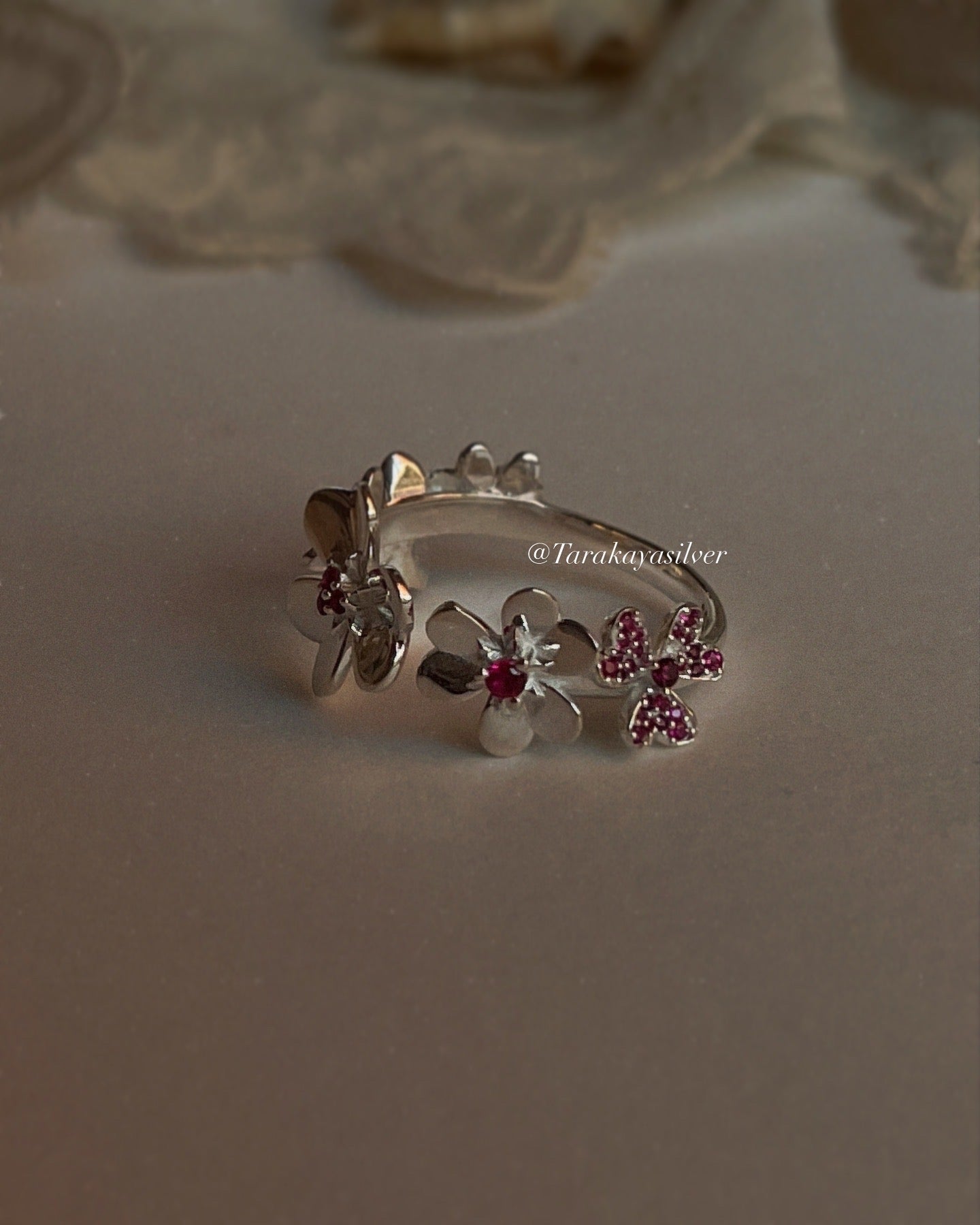 Statement ruby ring with lab-grown flowers in adjustable 925 silver band