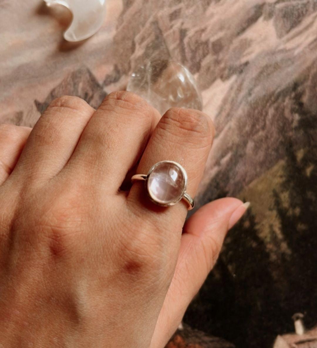 Handcrafted sterling silver ring with oval rose quartz stone