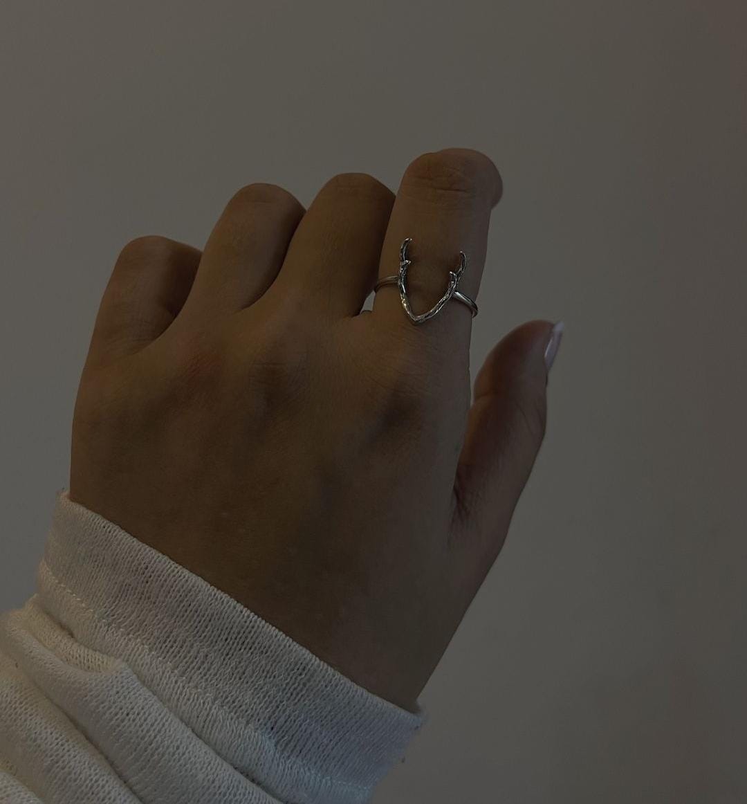 Handcrafted Antler 2 silver ring with a nature-themed design.