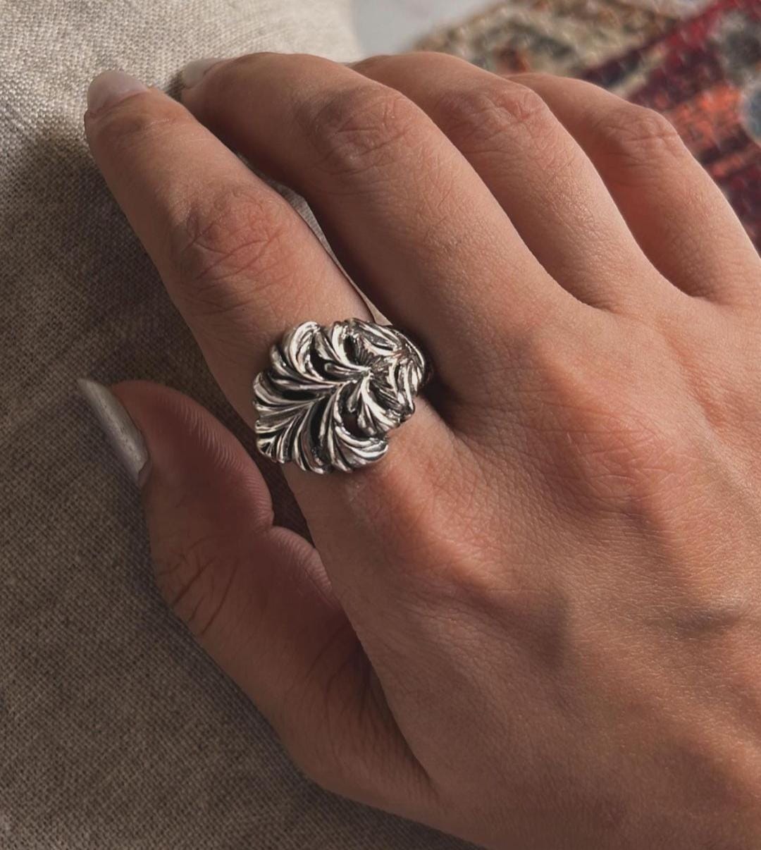Chunky vintage motif band ring with intricate detailing