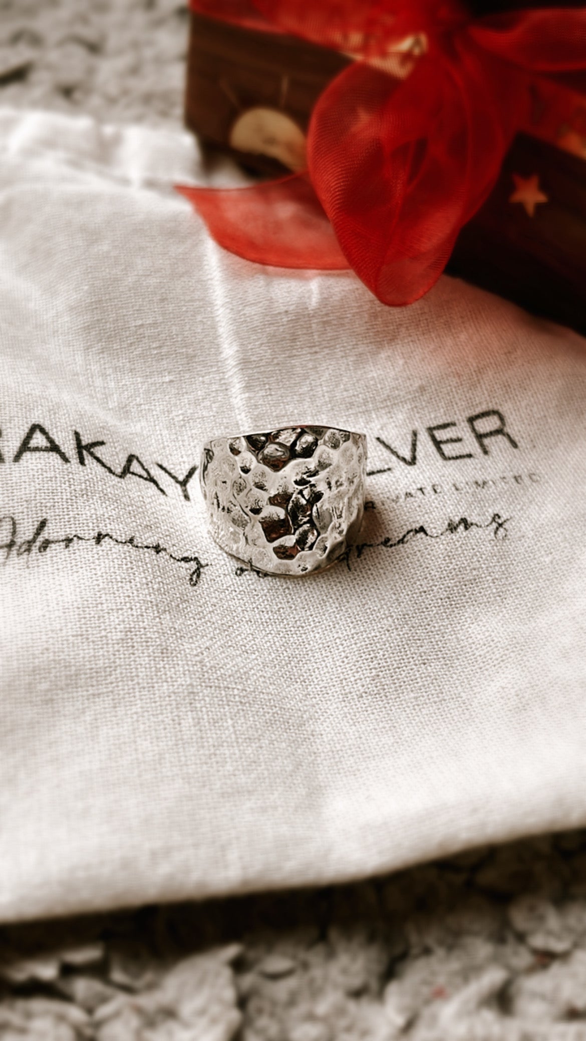 Chunky hammered silver ring with a contemporary design