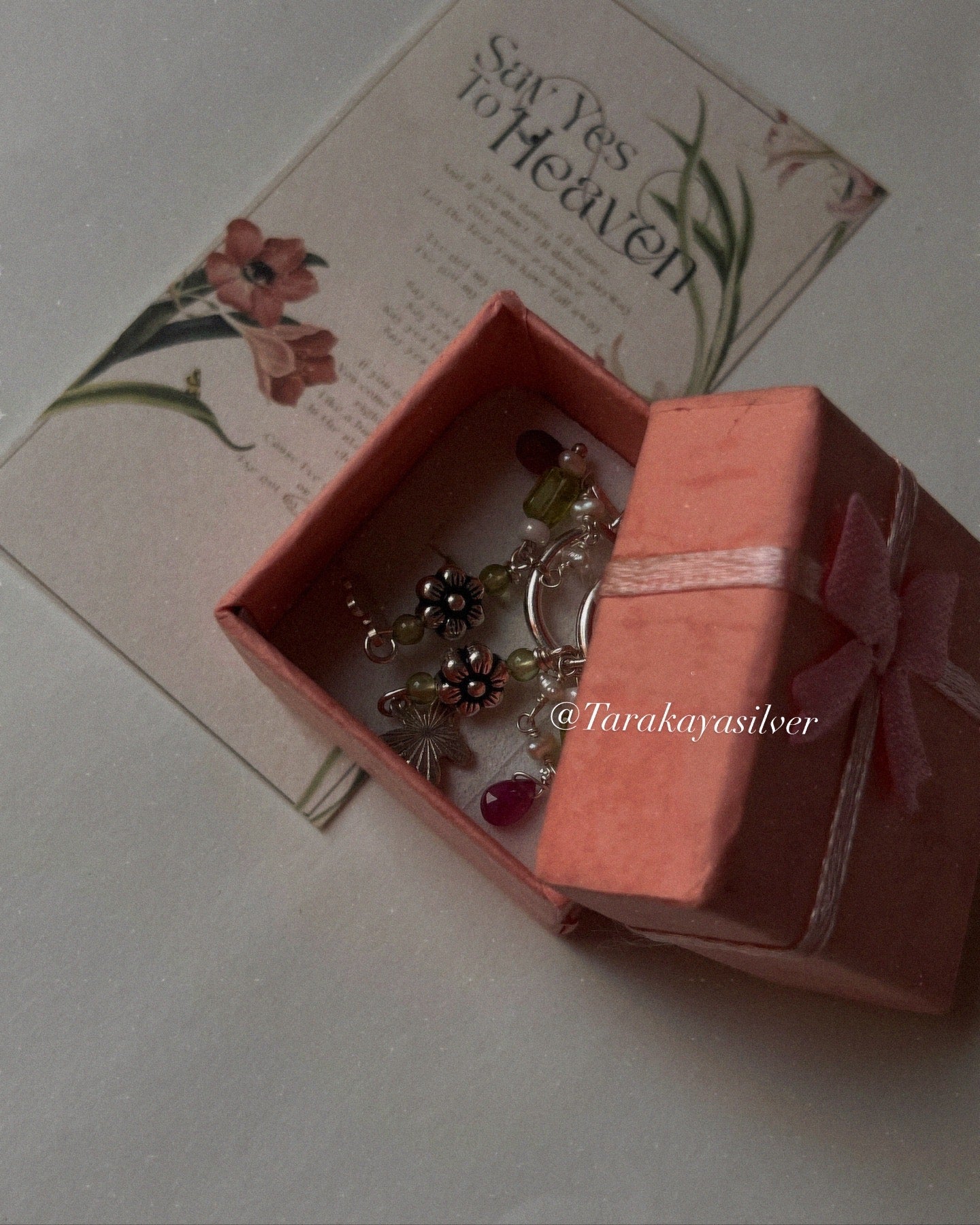 Nature-inspired Italian silver hoops with butterfly and flower charms