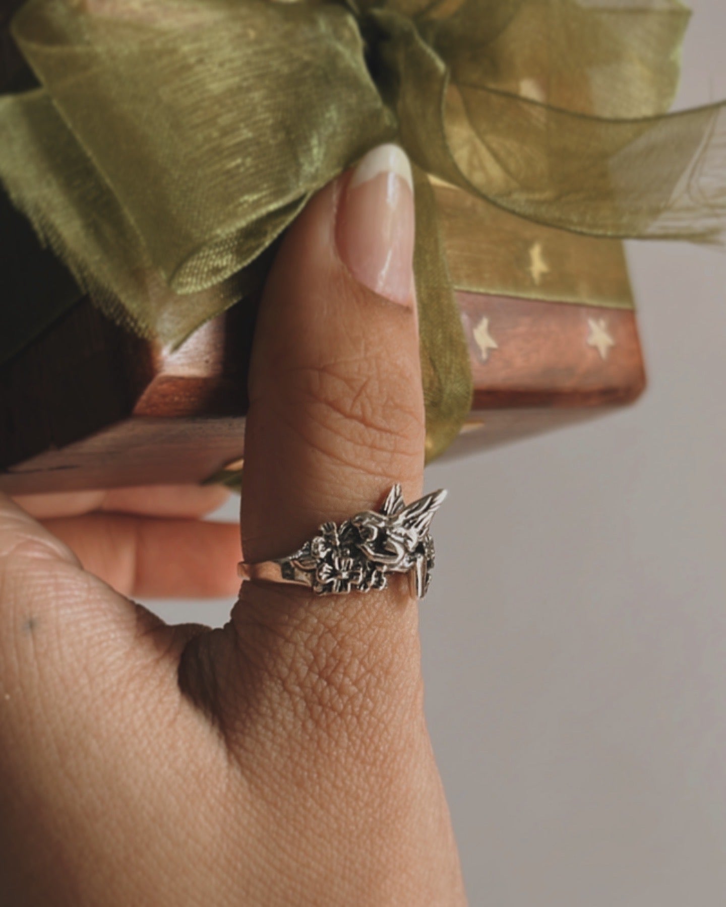Handcrafted fairy in the garden silver ring with detailed floral accents