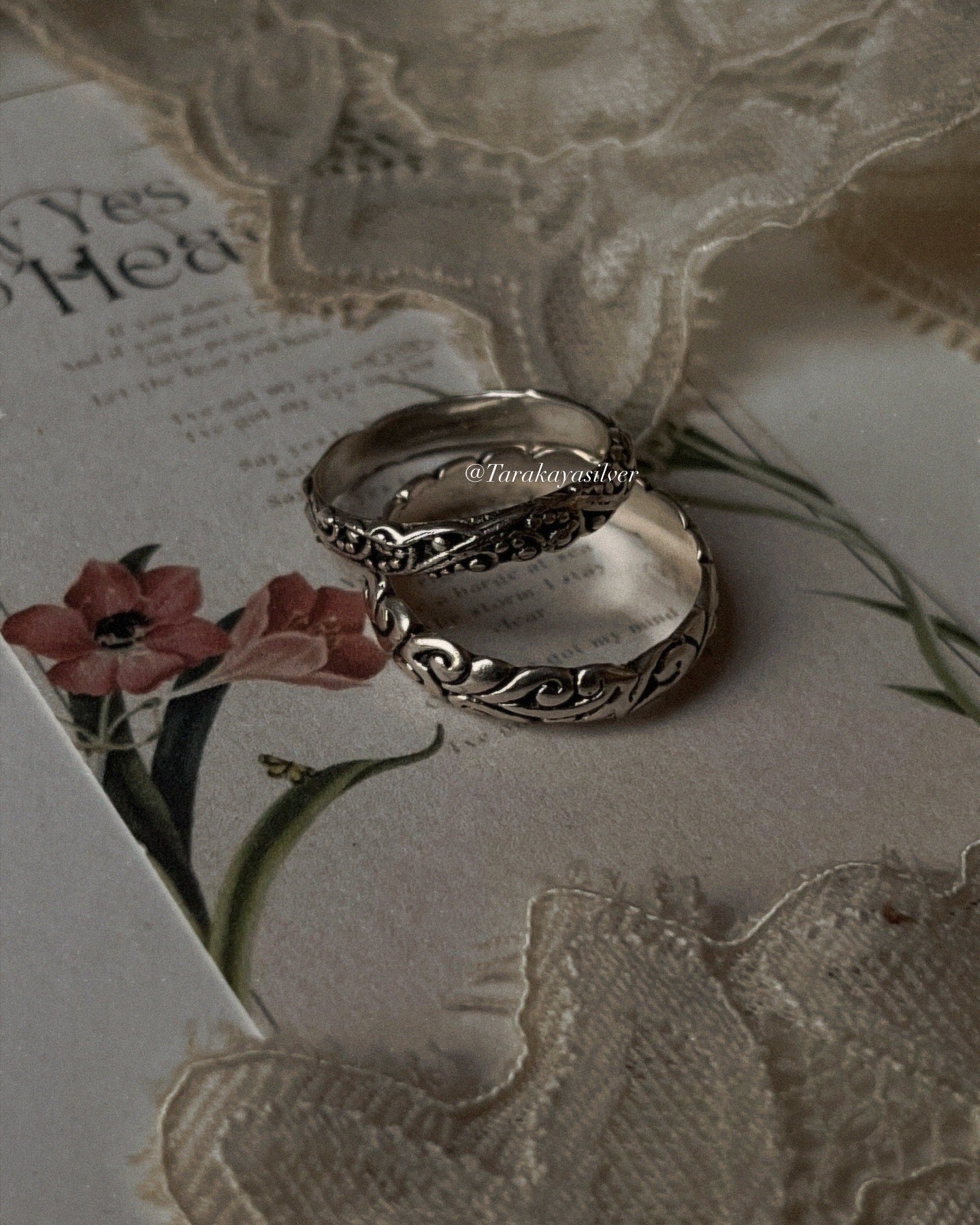 Silver stacking rings with intricate vintage motifs for a classic look