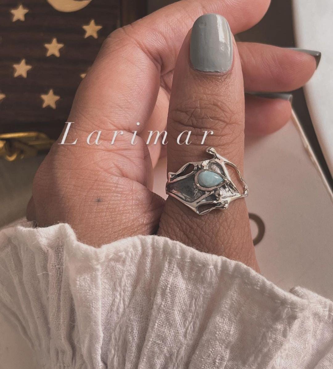 Handcrafted Larimar Molten Drip Silver Ring with Elegant Detail