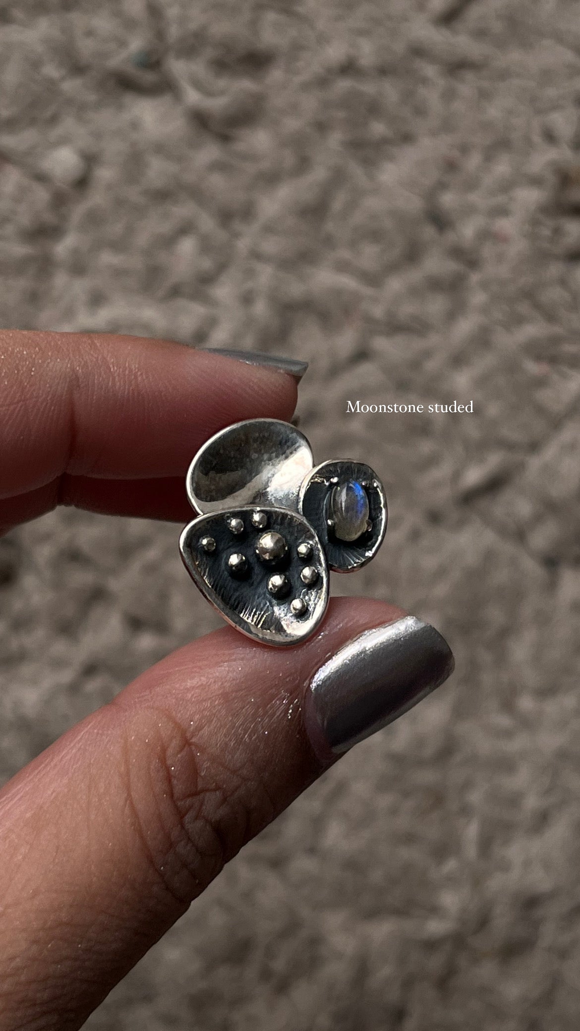 Close-up of Divine Lotus moonstone silver ring with intricate detailing