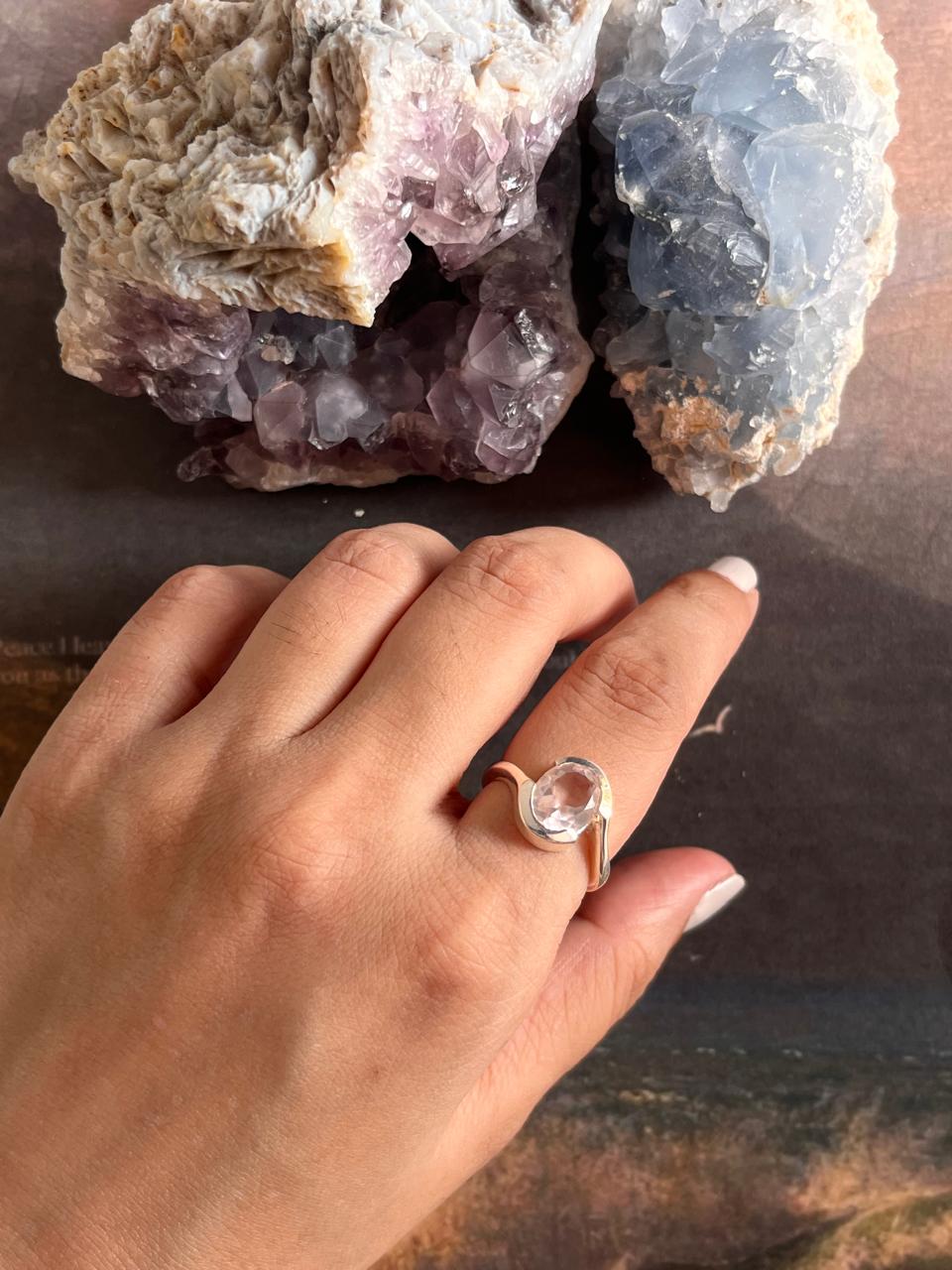 Elegant rose quartz oval ring with cross band details in sterling silver