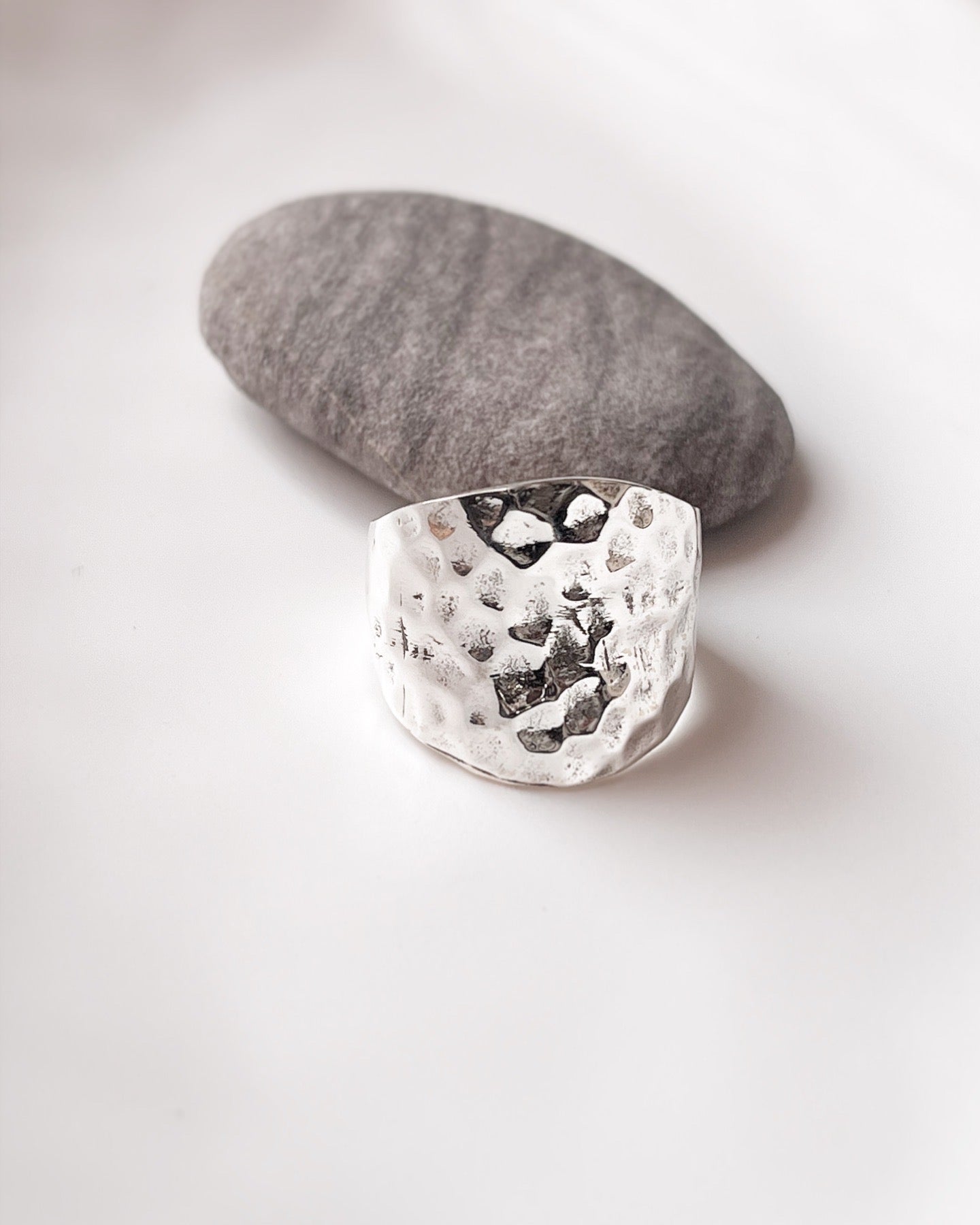 Sleek chunky silver ring with hammered texture