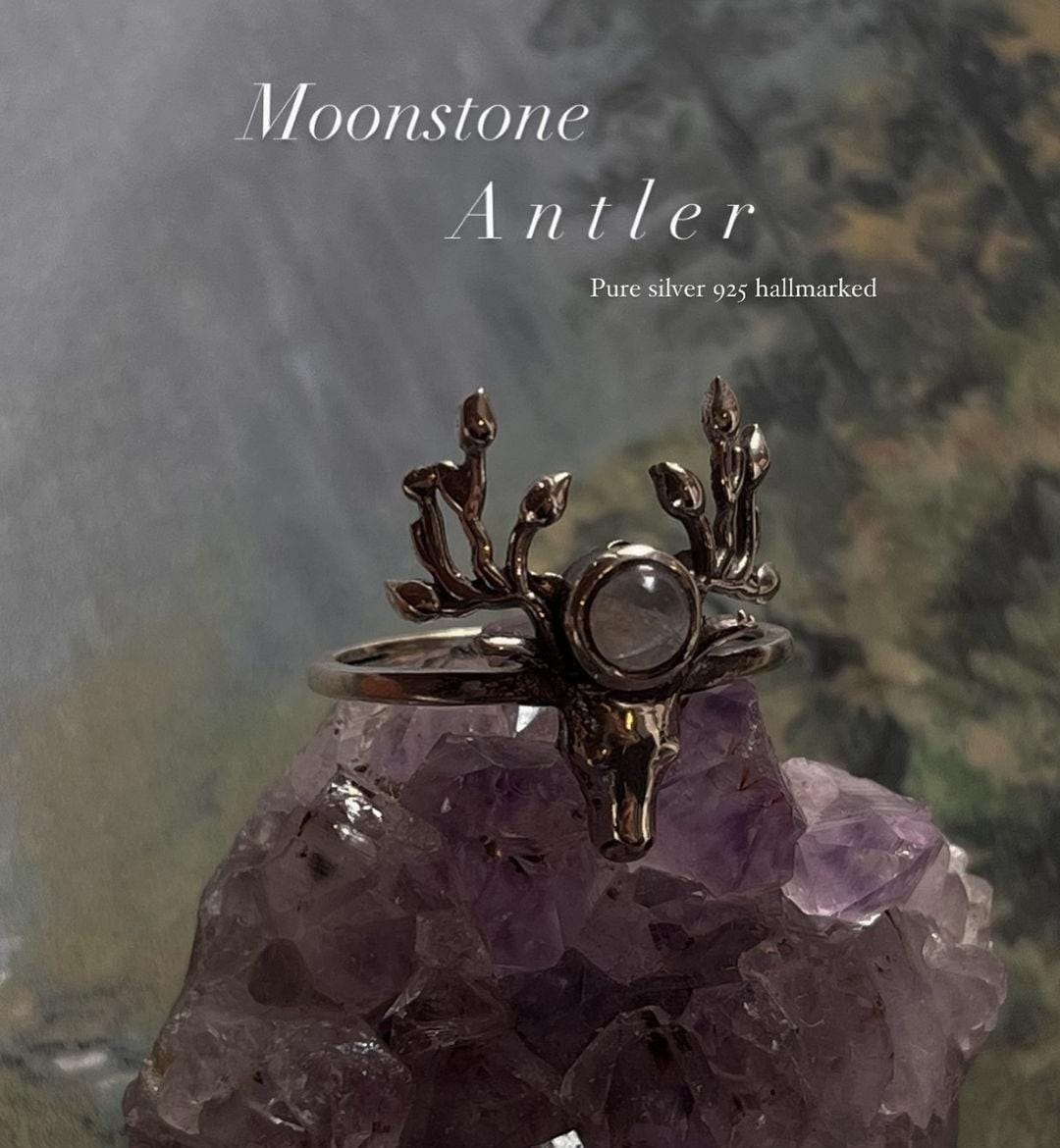 Antler design silver ring with a beautiful moonstone centerpiece.