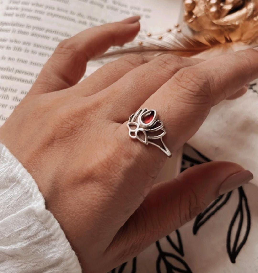 Garnet gemstone set in a divine lotus silver ring