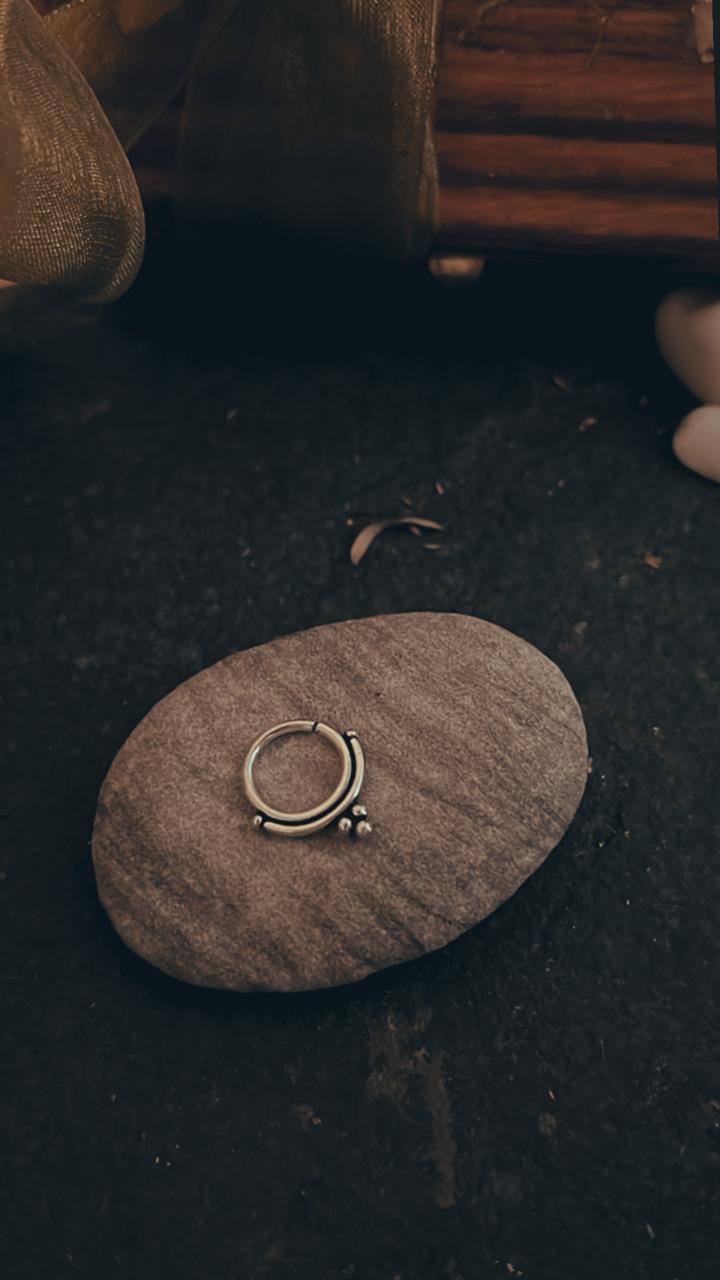 Minimalist pierced septum ring in sterling silver