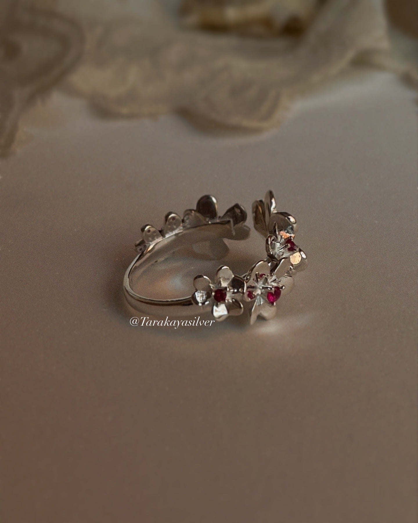 Lab-grown ruby flower bouquet ring with adjustable silver band