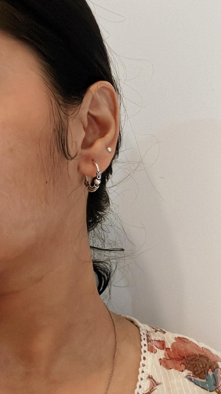 Classic design 2 antique silver hoop earrings for a chic look.