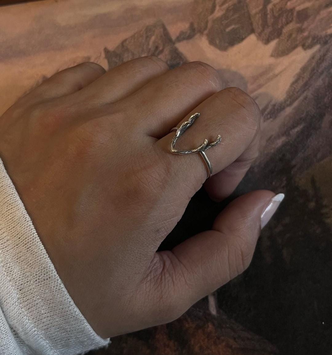 Modern Antler 2 silver ring with a rustic, nature-inspired design.