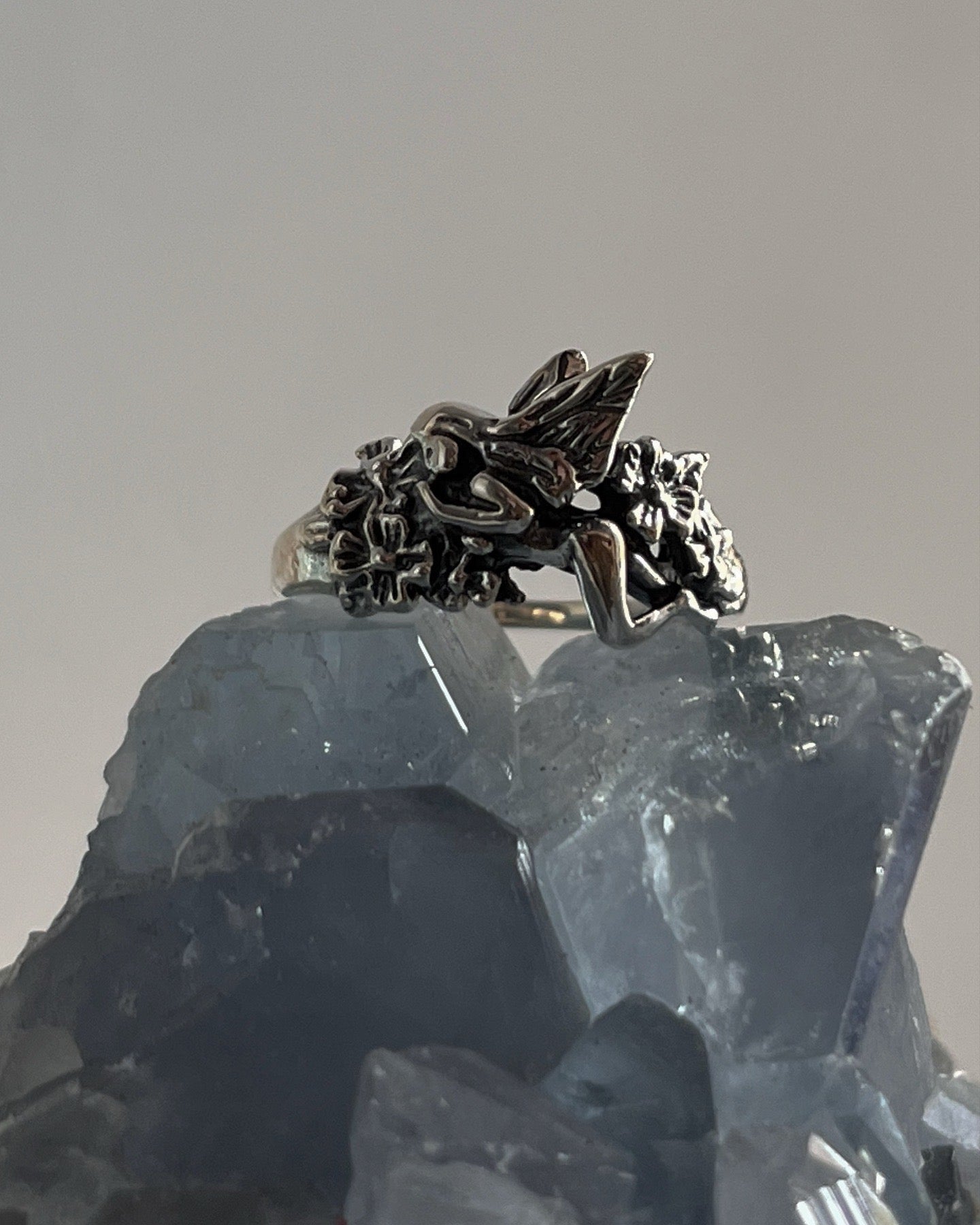 Sophisticated fairy in the garden silver ring with graceful, garden scene