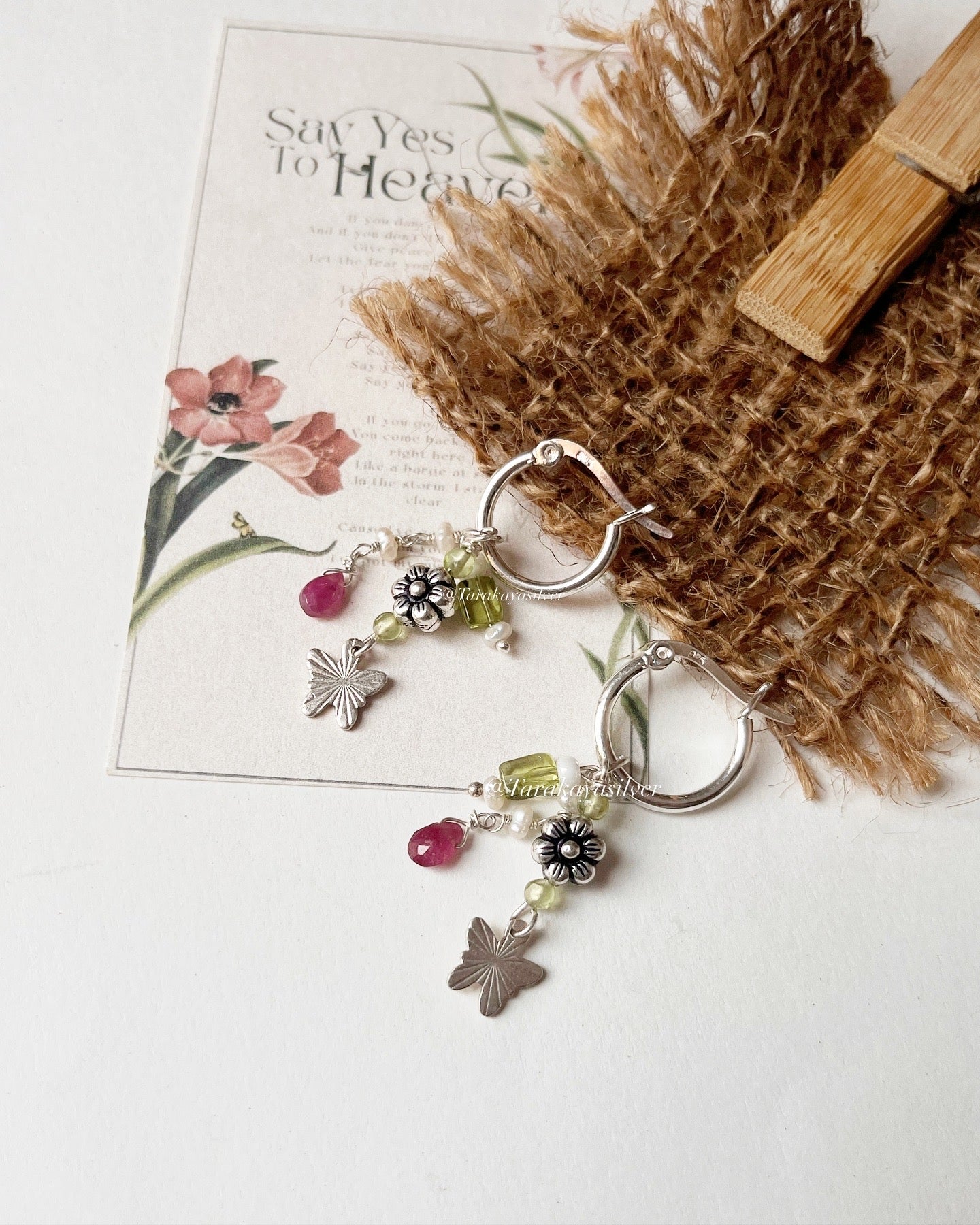 Sterling silver Italian hoops with flower, butterfly, and gemstone charms