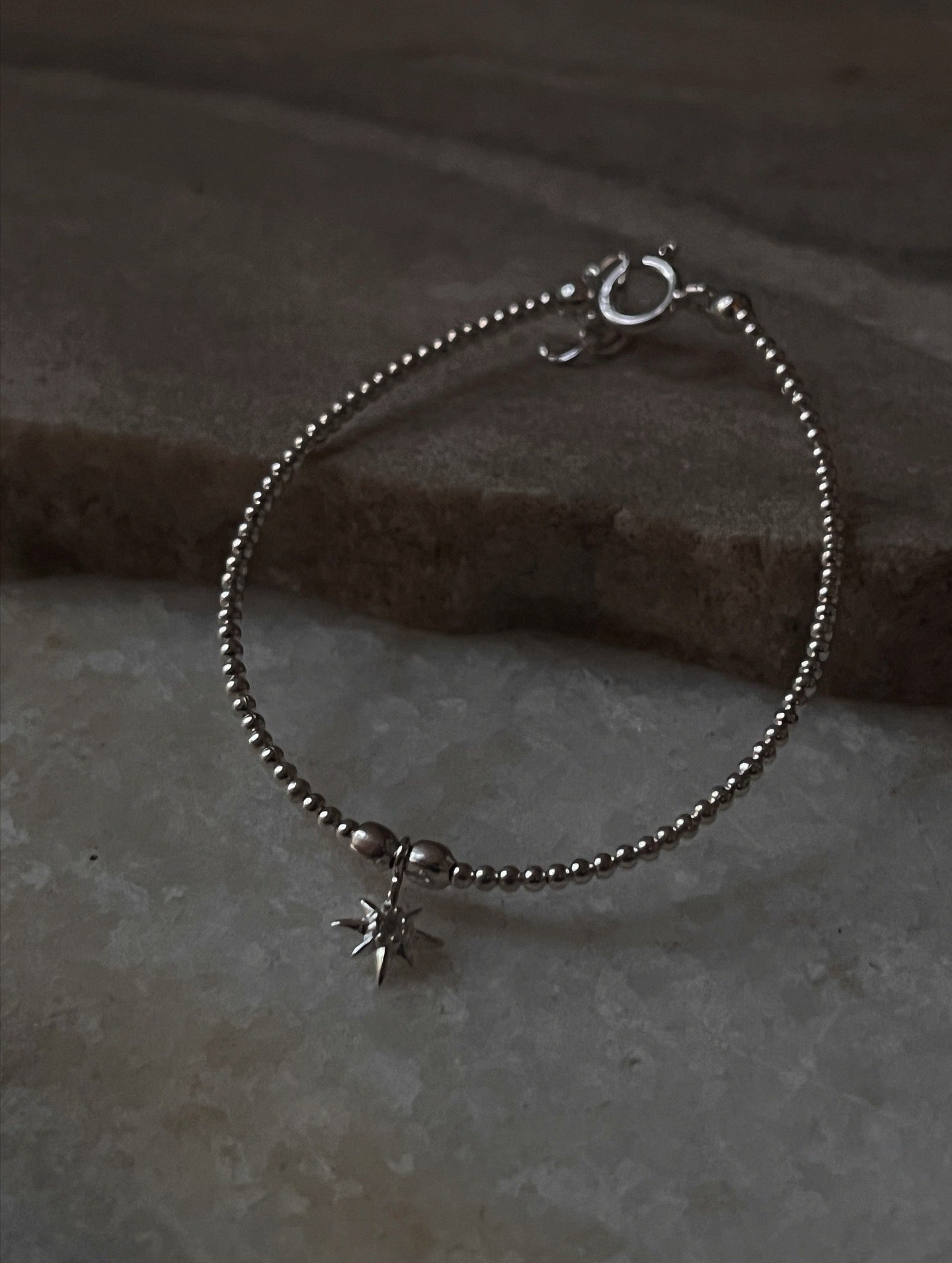 White Topaz North Star Charm Bracelet in 925 Sterling Silver