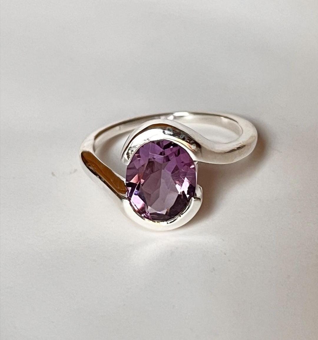 Amethyst Gemstone in Oval Cut with Cross Band Silver Ring