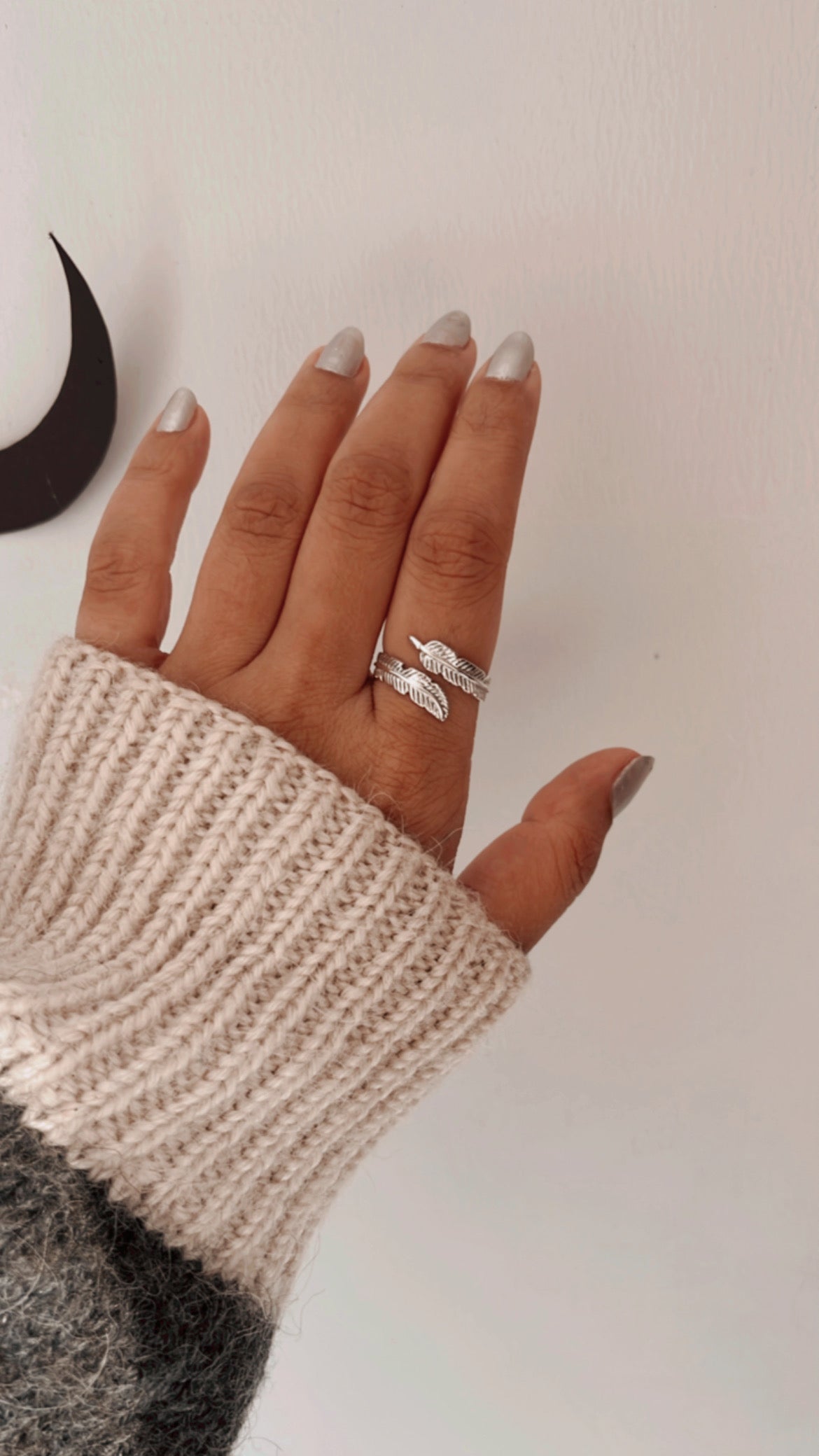 Versatile feather wrap silver ring with an adjustable band for a comfortable fit