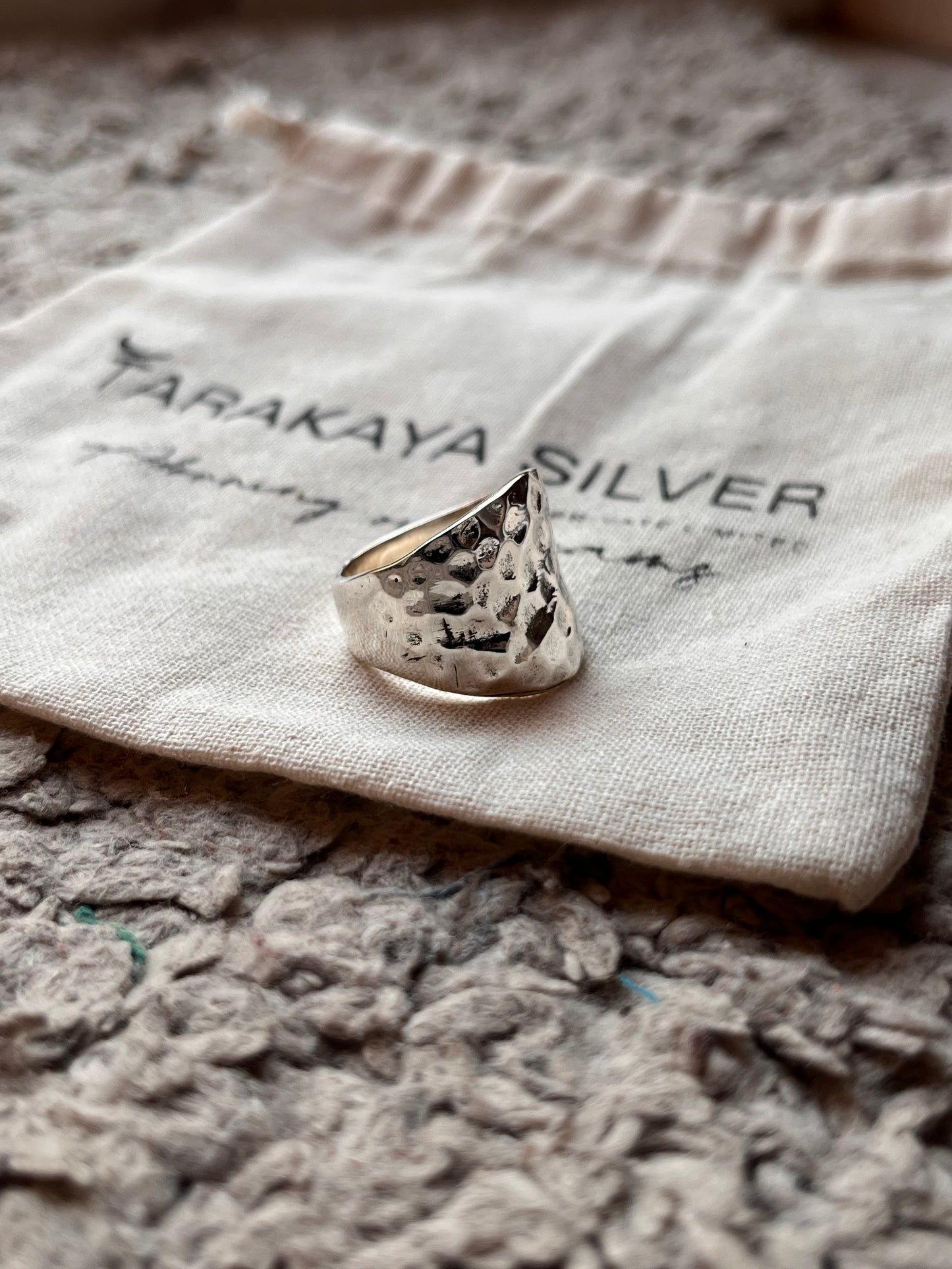 Stylish hammered silver ring with bold chunky design