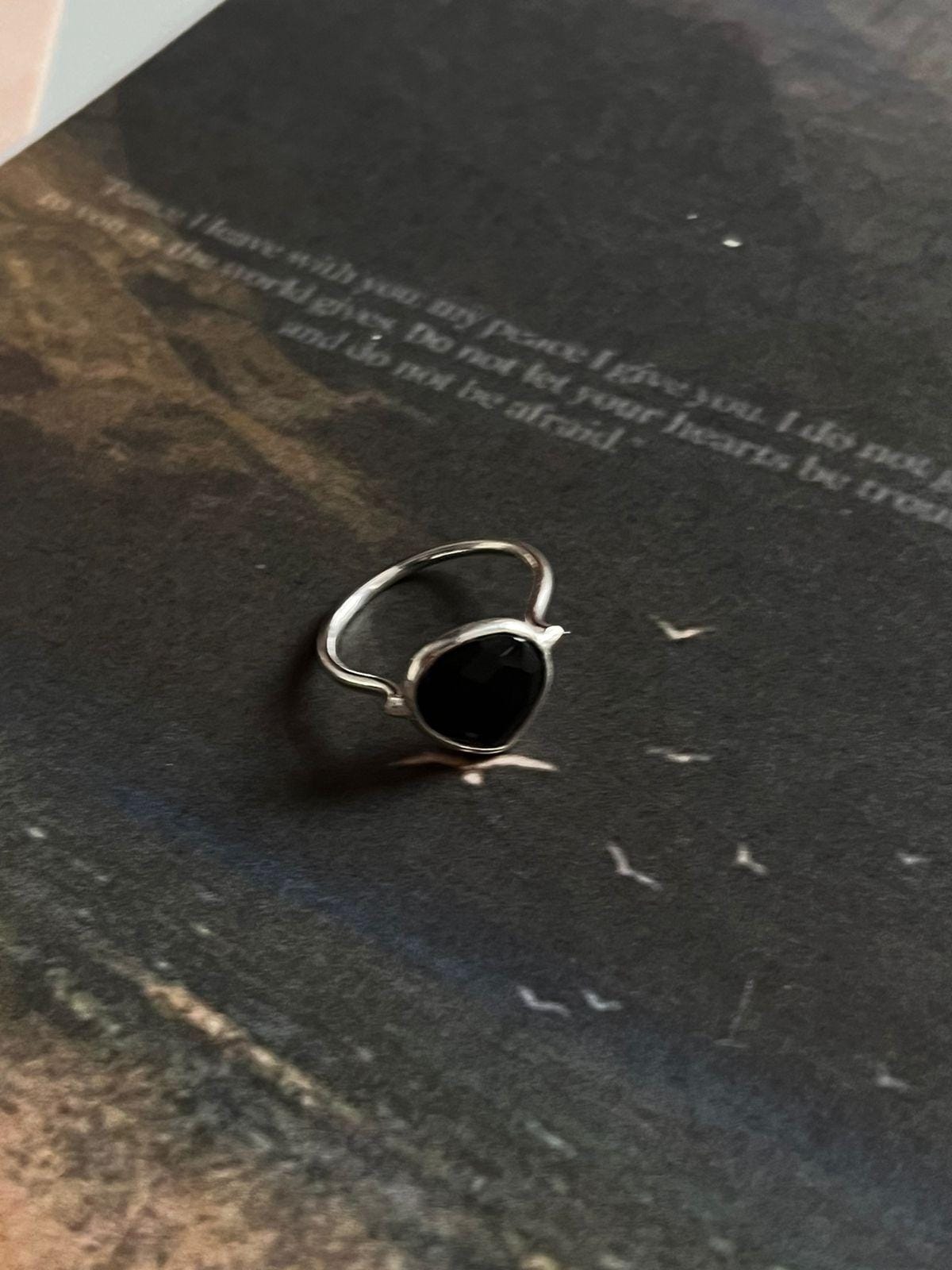 Sleek Silver Heart Ring with Faceted Black Onyx