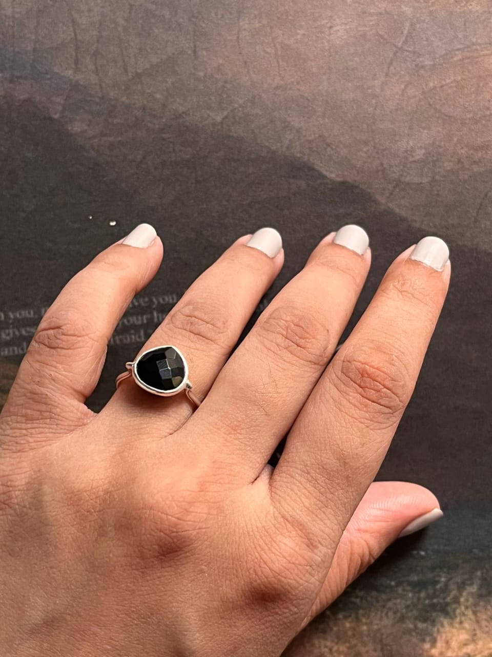 Elegant Faceted Black Onyx Heart Ring in Silver