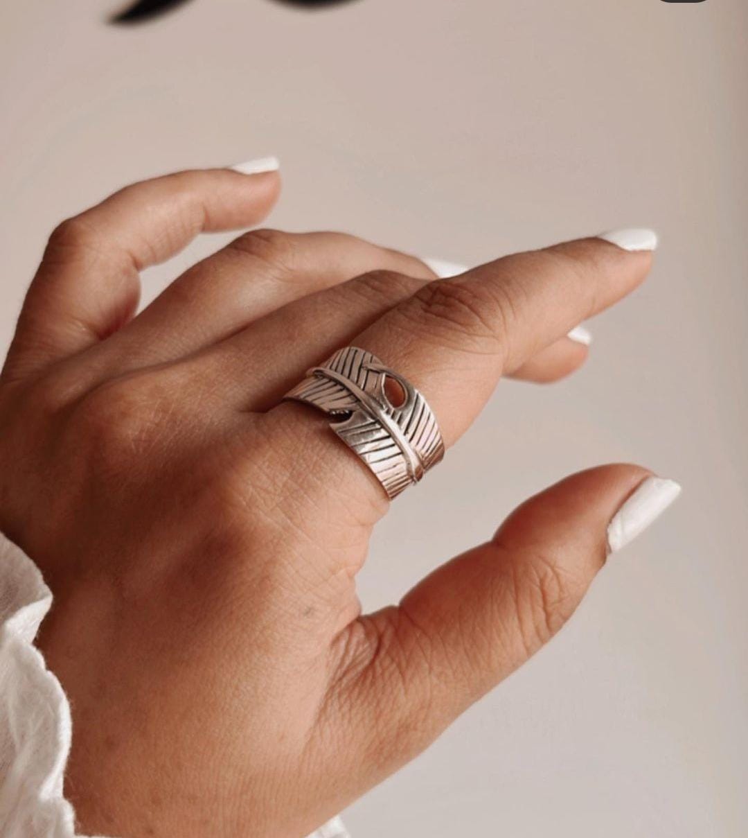 Versatile feather wrap adjustable silver ring with a lightweight, delicate touch