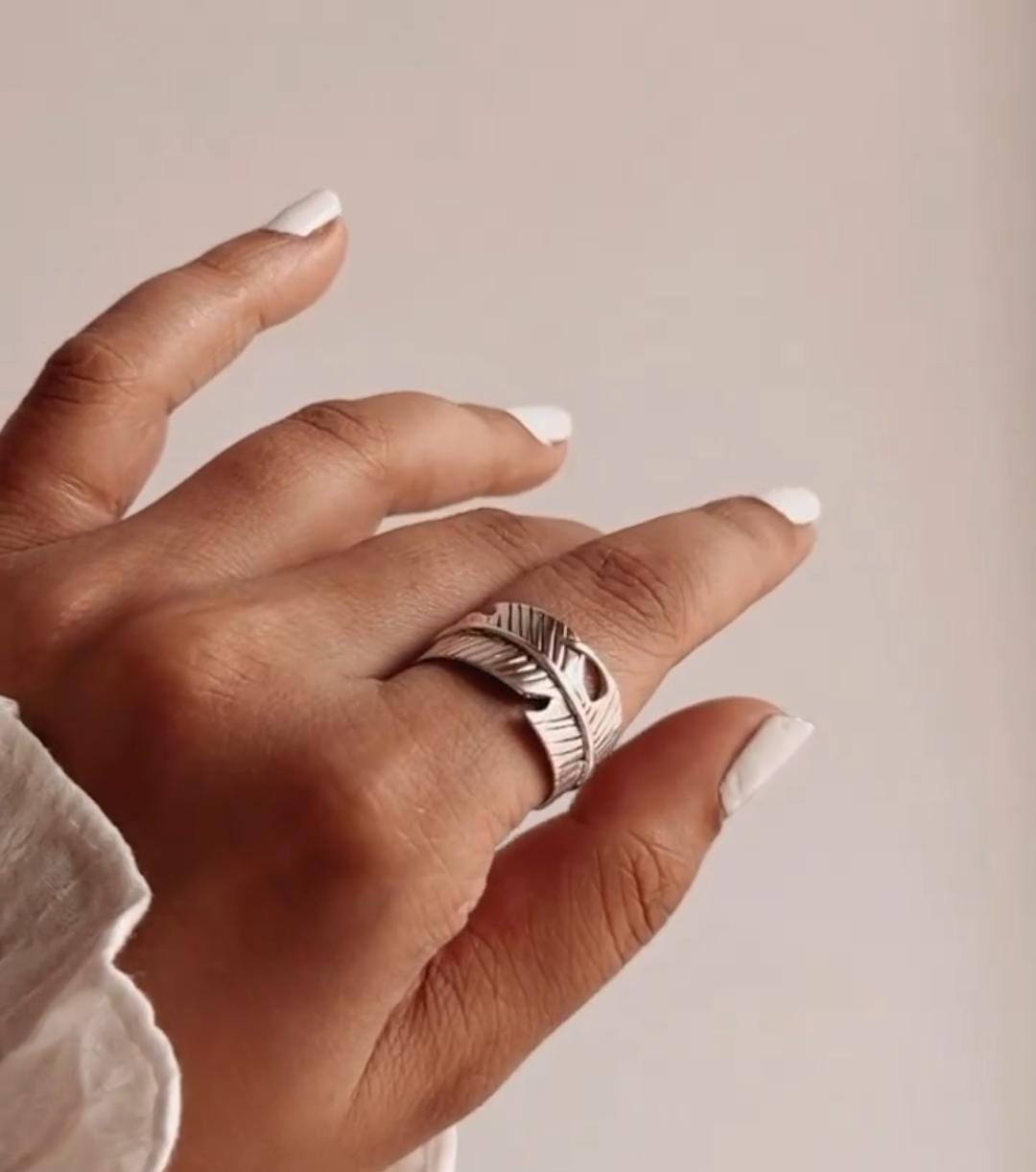 Trendy feather wrap adjustable silver ring perfect for adding a natural charm