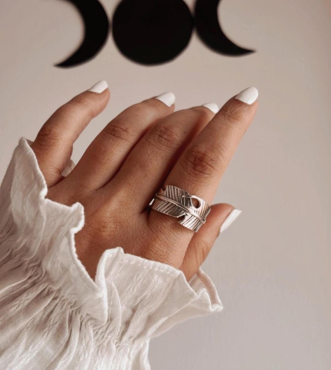 Elegant feather wrap adjustable silver ring with intricate detailing