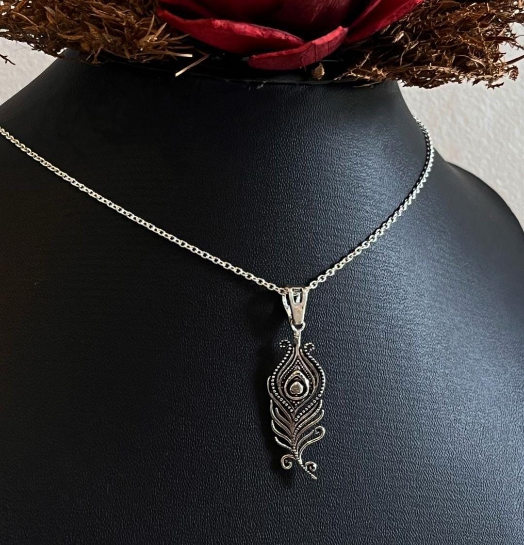 Elegant Mor Pankh Silver Pendant with Feather Design