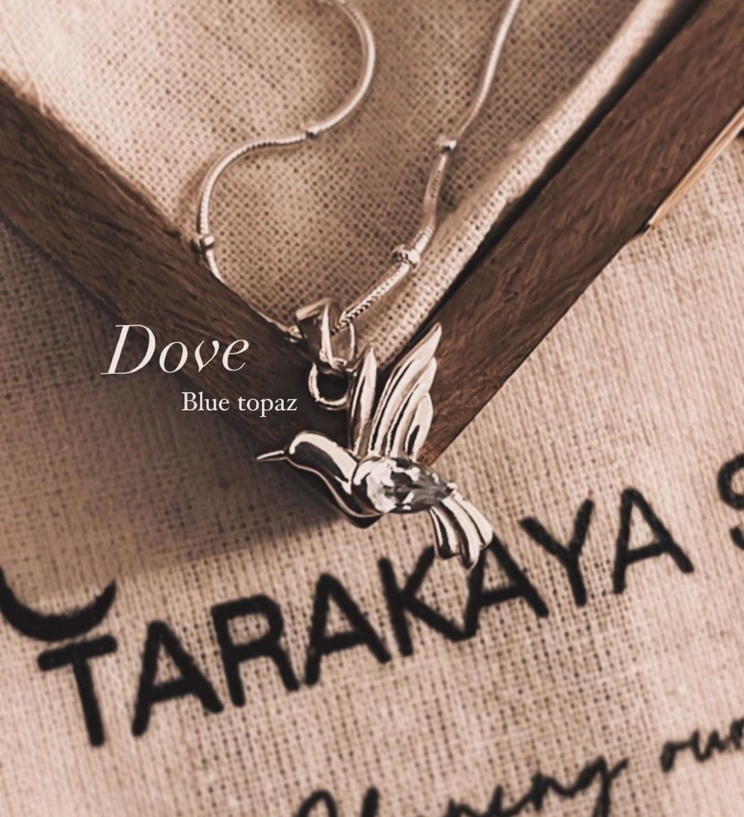 Blue Topaz Dove Silver Pendant