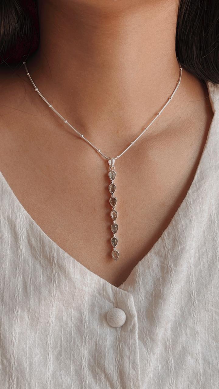 Green tourmaline pear-shaped pendant in sterling silver for a sophisticated look