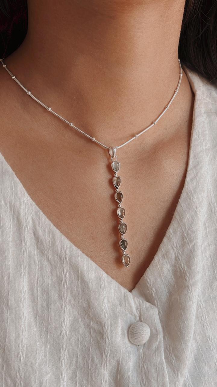 Simple and elegant green tourmaline pear pendant in silver