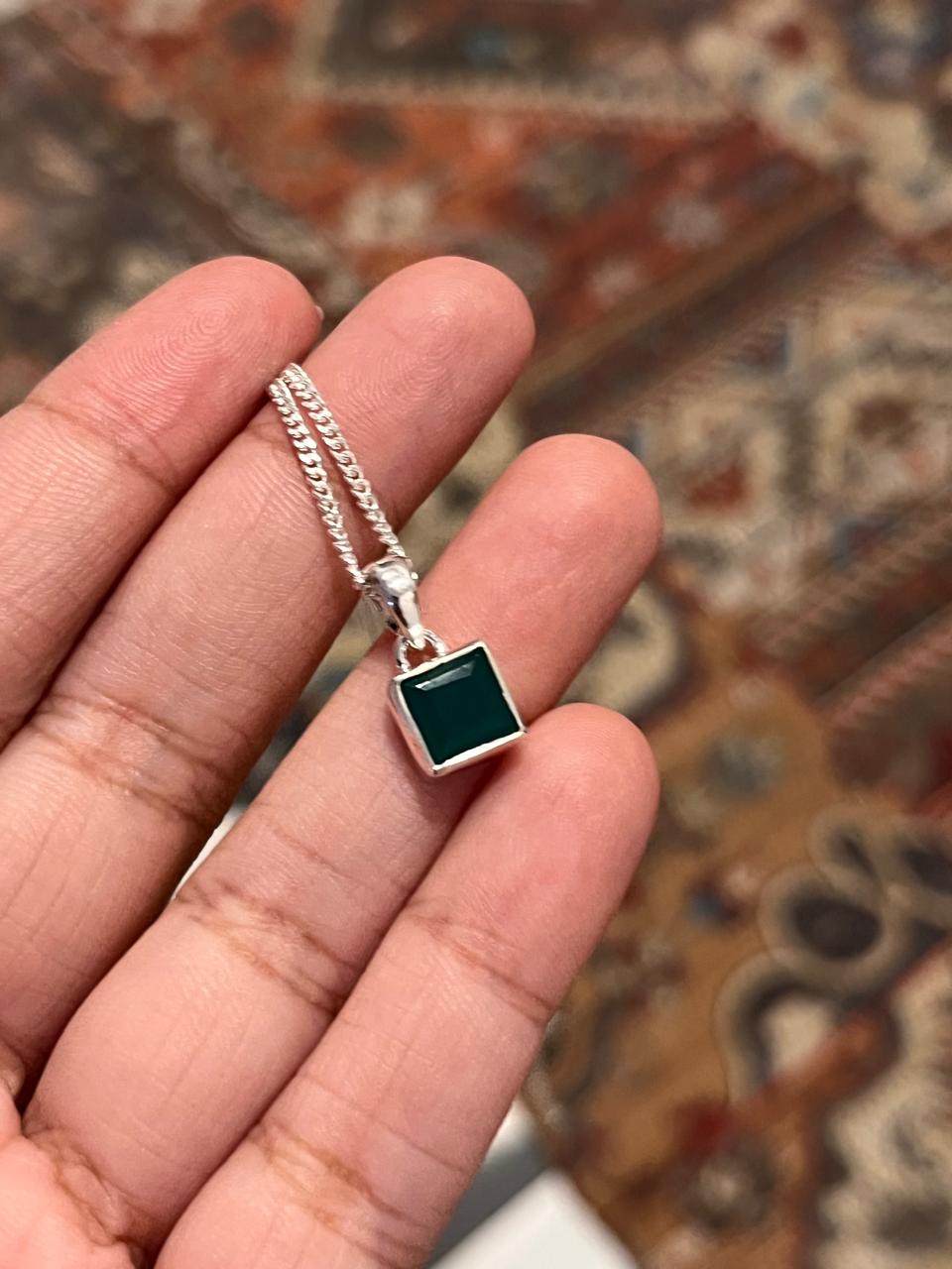 Charming green onyx square cut pendant in a silver frame