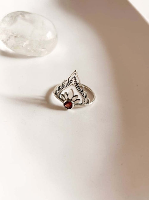 Bohemian crown silver ring adorned with garnet gemstone