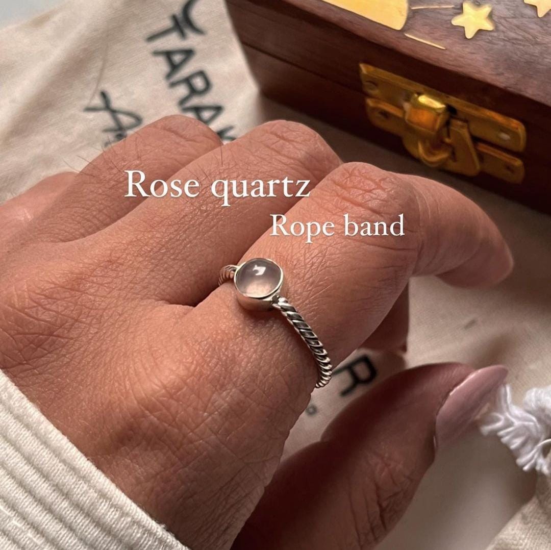 Rose quartz rope band silver ring with intricate design