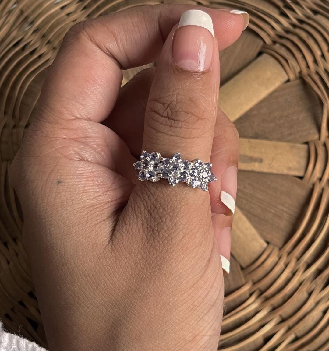 Handcrafted tanzanite three flower ring in sterling silver