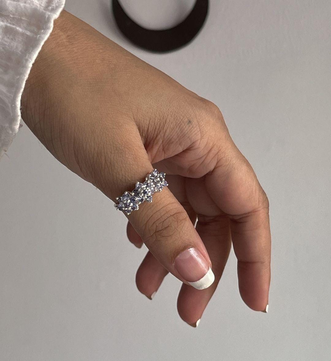 Trendy tanzanite three flower design ring in silver