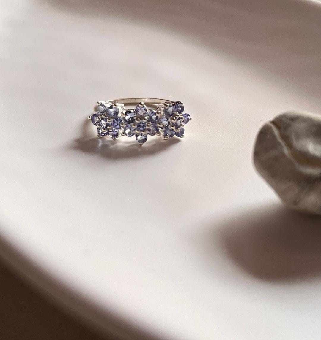 Tanzanite gemstone three flower silver ring