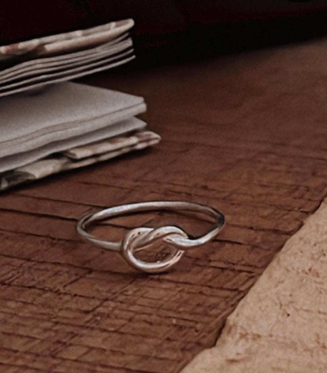 Elegant Promise Knot Ring in Silver
